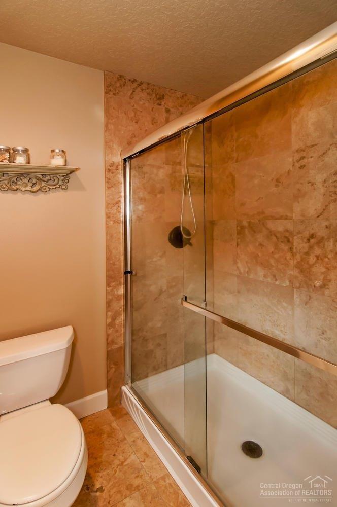20725 Kilbourne Loop Bend, OR 97701 - Photo 11 of 22 The master shower features beautiful til
