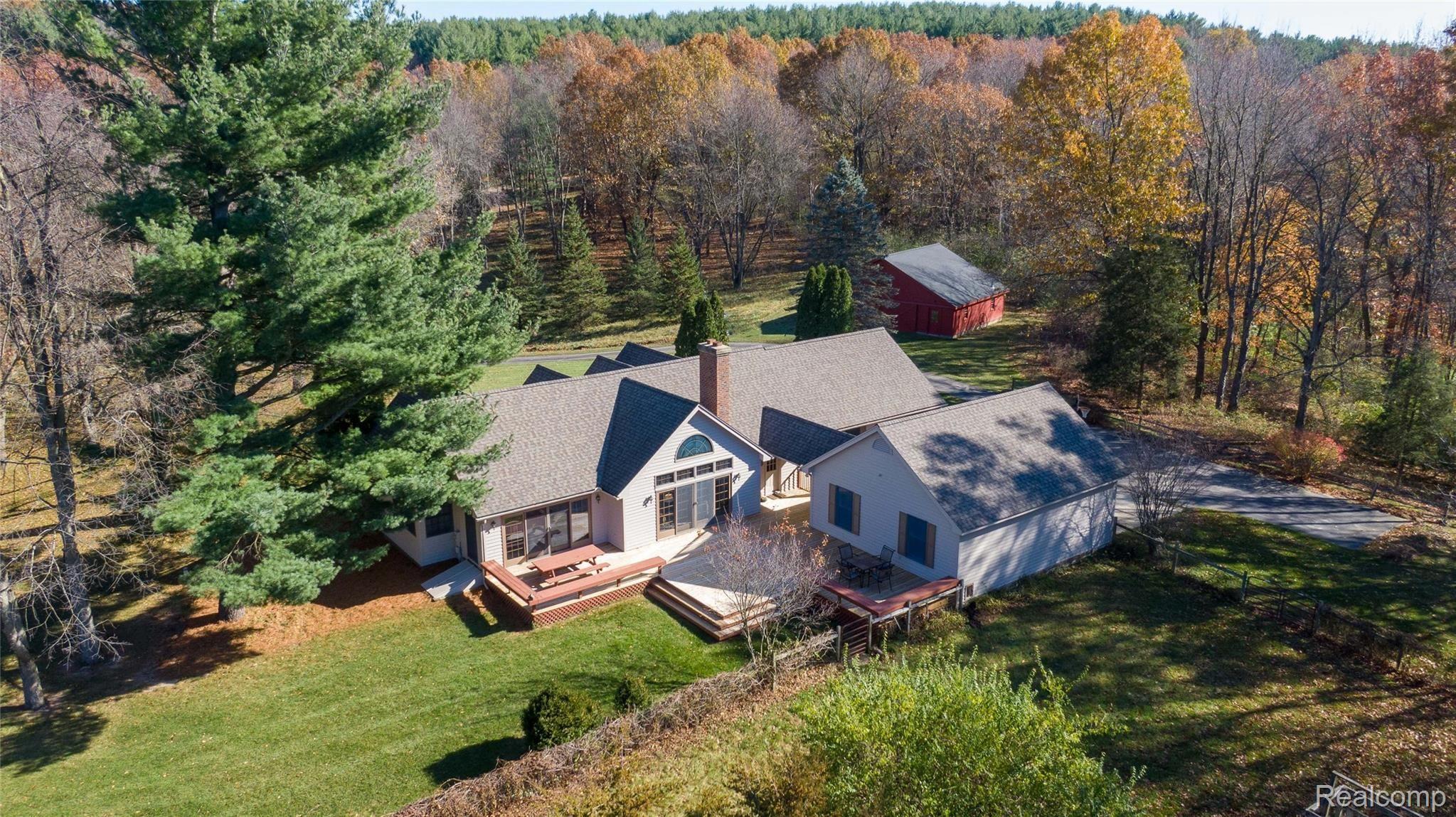 7231 Toma Road Dexter, MI 48130 - Photo 3 of 44 Backview.jpg