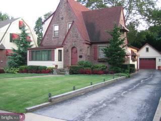 504 Valley Road Havertown, PA 19083 - Photo 1 of 6 a front view of house with yard and green space