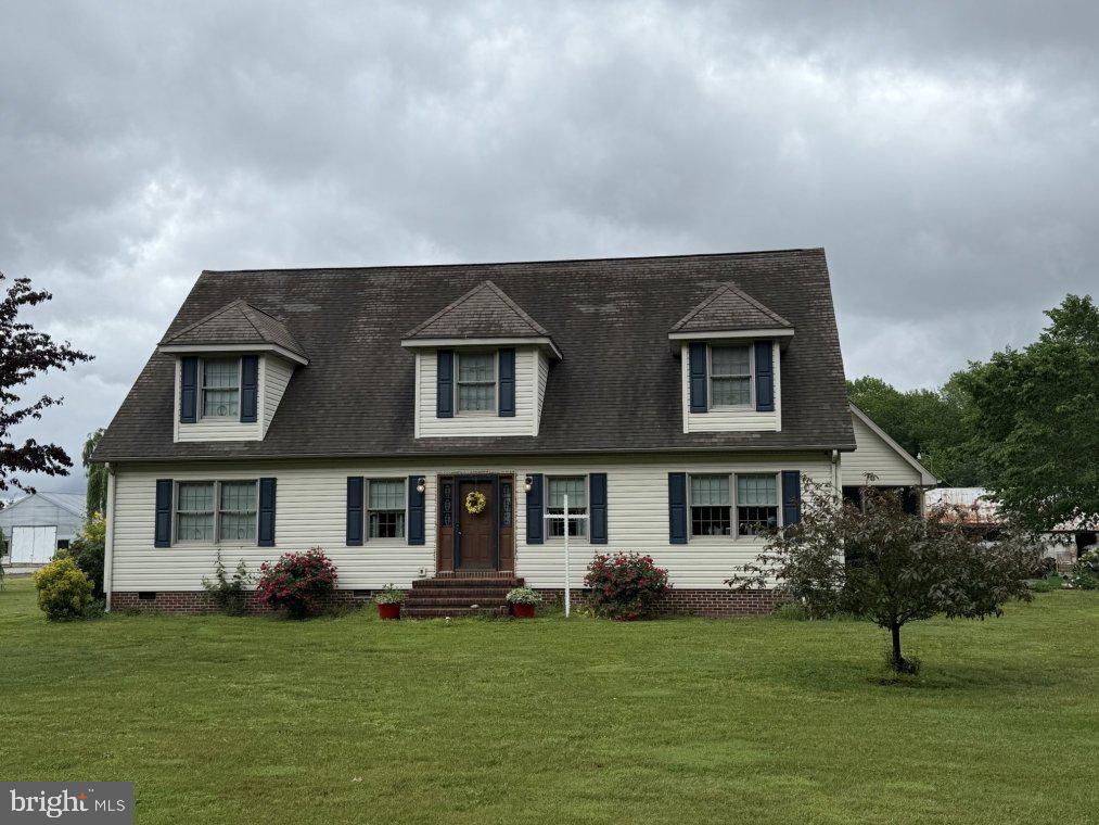 4333 Golden Hill Road Church Creek, MD 21622 - Photo 2 of 10 a front view of a house with a garden