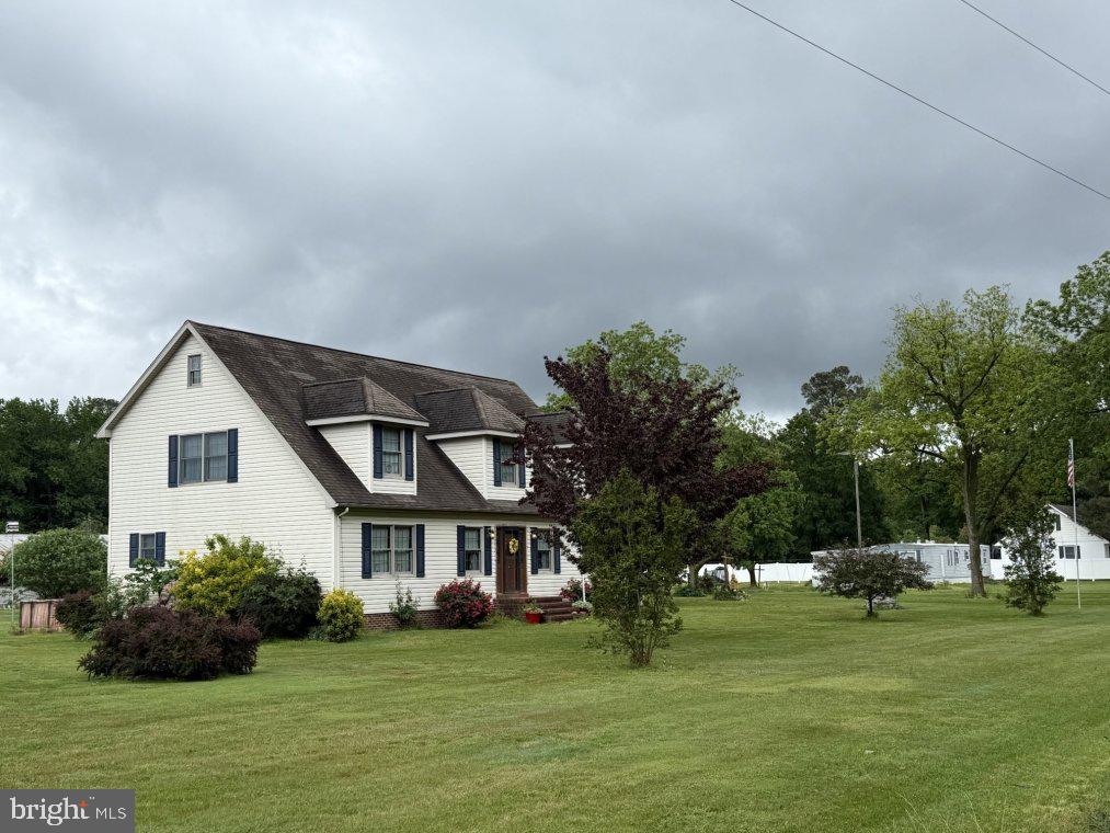 4333 Golden Hill Road Church Creek, MD 21622 - Photo 3 of 10 a front view of a house with a garden