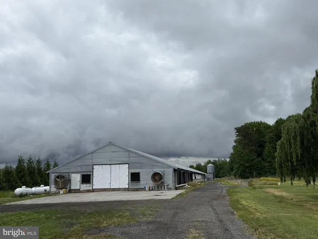 a view of a wooden door of the house