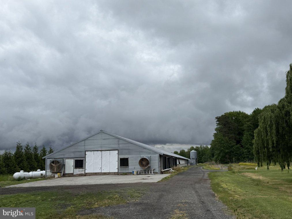 4333 Golden Hill Road Church Creek, MD 21622 - Photo 5 of 10 a front view of a house with a garden