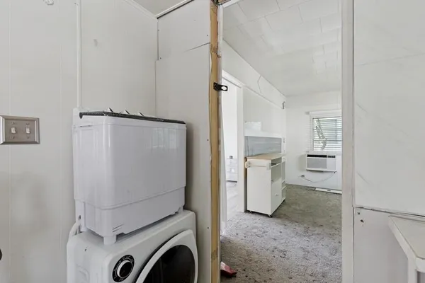 a view of a storage & utility room with washer and dryer