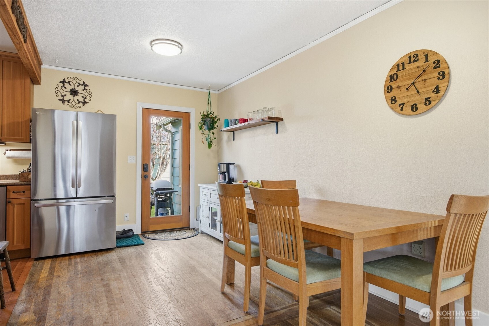 2712 Victor Street Bellingham, WA 98225 - Photo 11 of 40 a dining room with furniture and wooden floor