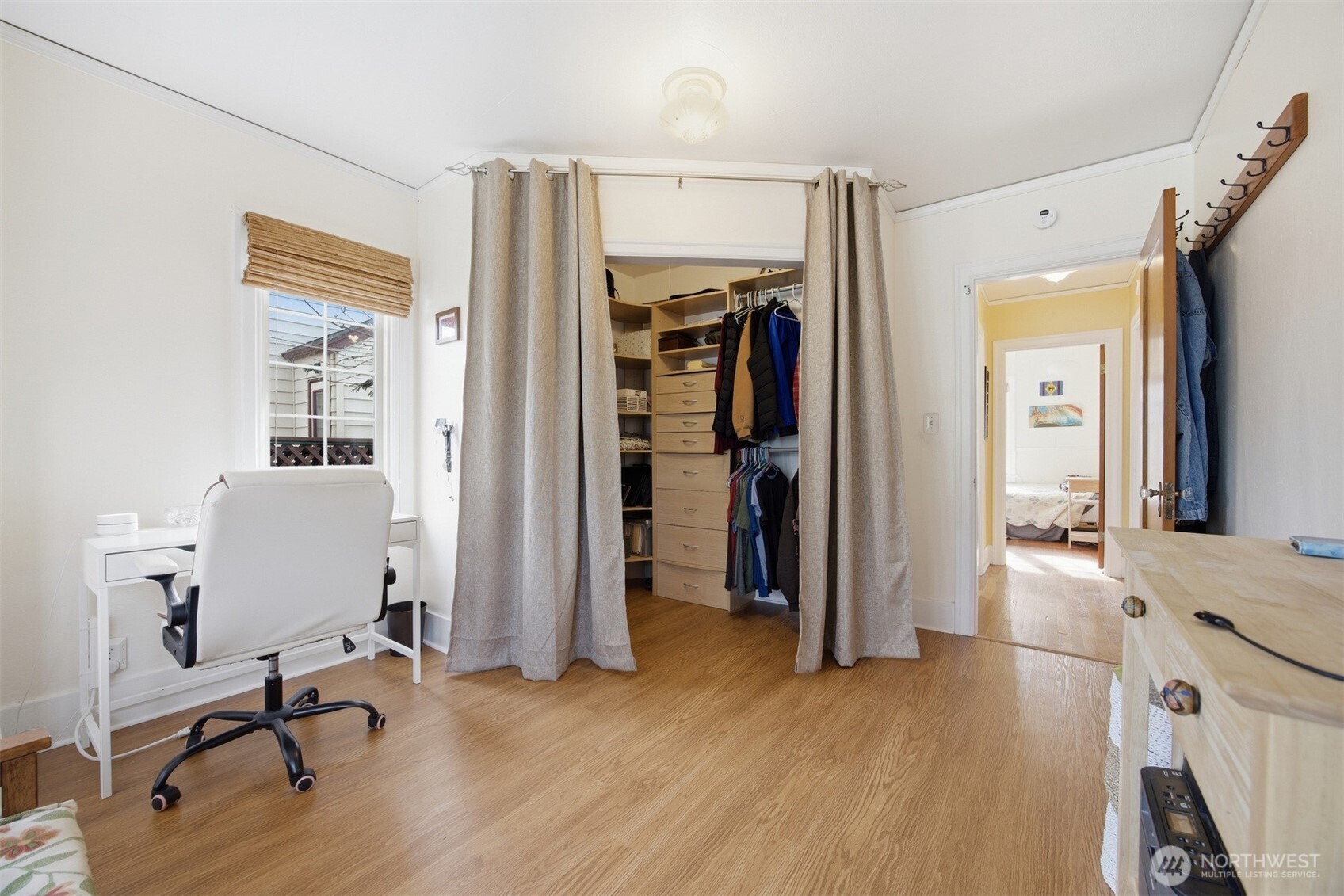 2712 Victor Street Bellingham, WA 98225 - Photo 14 of 40 a view of a workspace with wooden floor and furniture