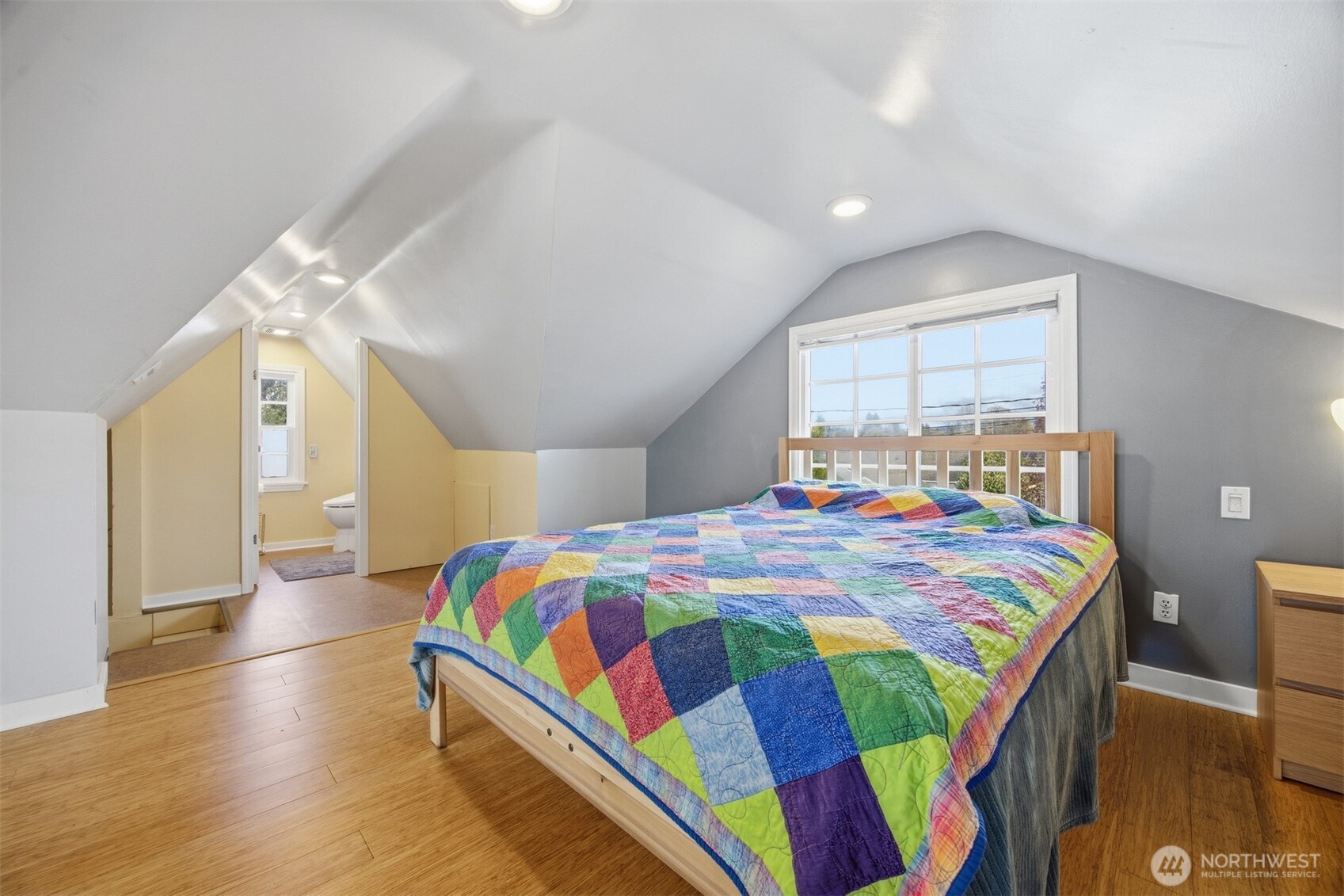 2712 Victor Street Bellingham, WA 98225 - Photo 23 of 40 a bedroom with a bed and wooden floor