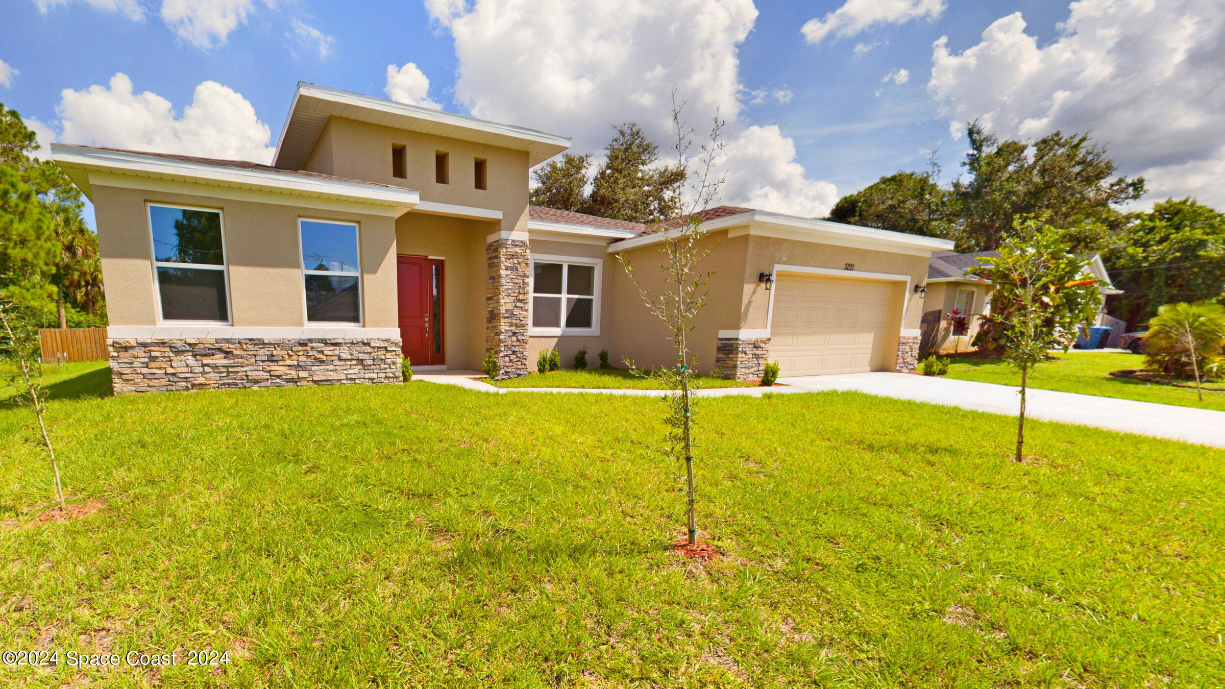 842 Angelico Road Northwest Palm Bay, FL 32907 - Photo 22 of 22 a front view of house with yard and swimming pool