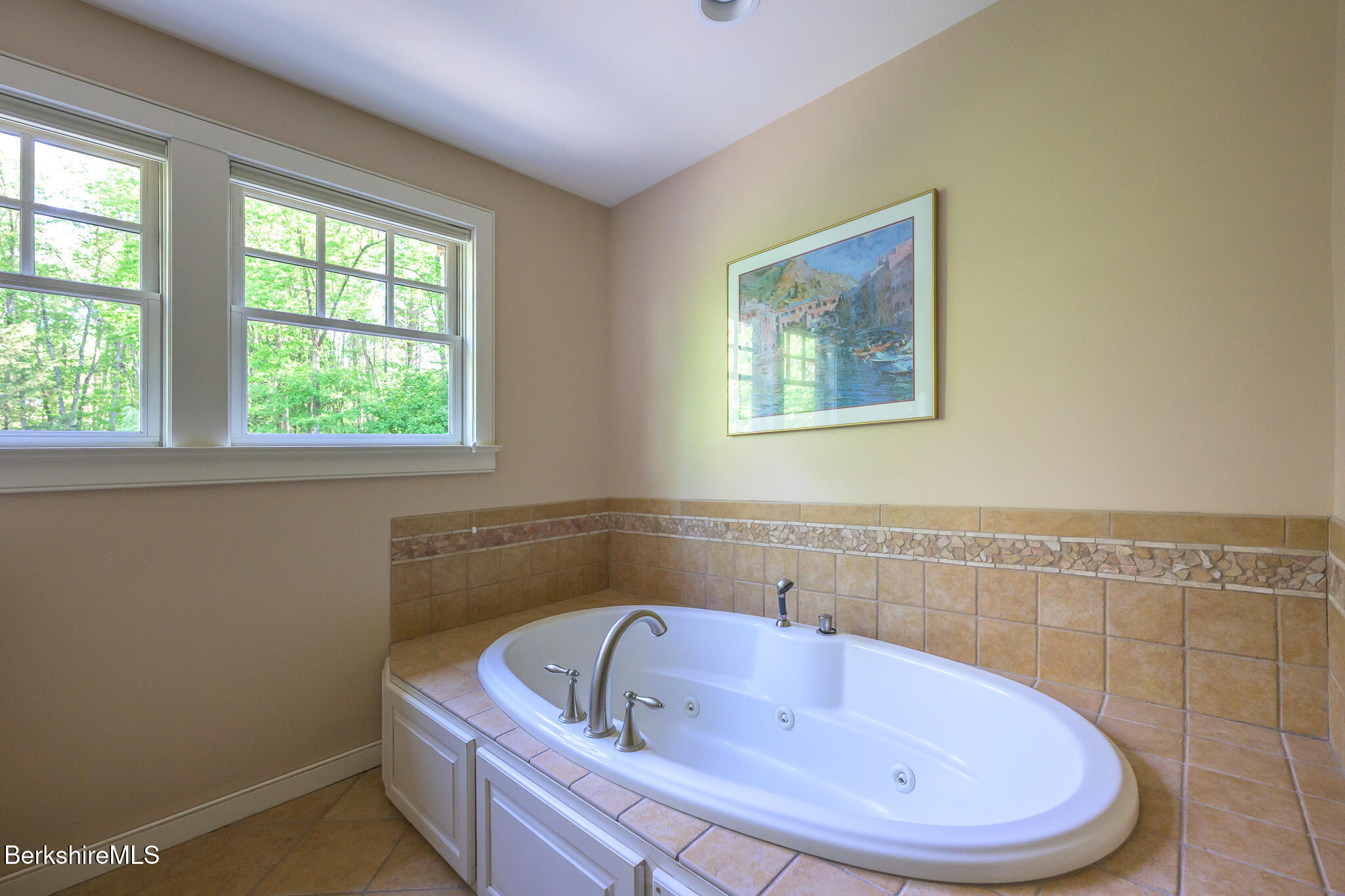 430 Lenox Road Richmond, MA 01254 - Photo 47 of 66 a bathroom with a tub and window