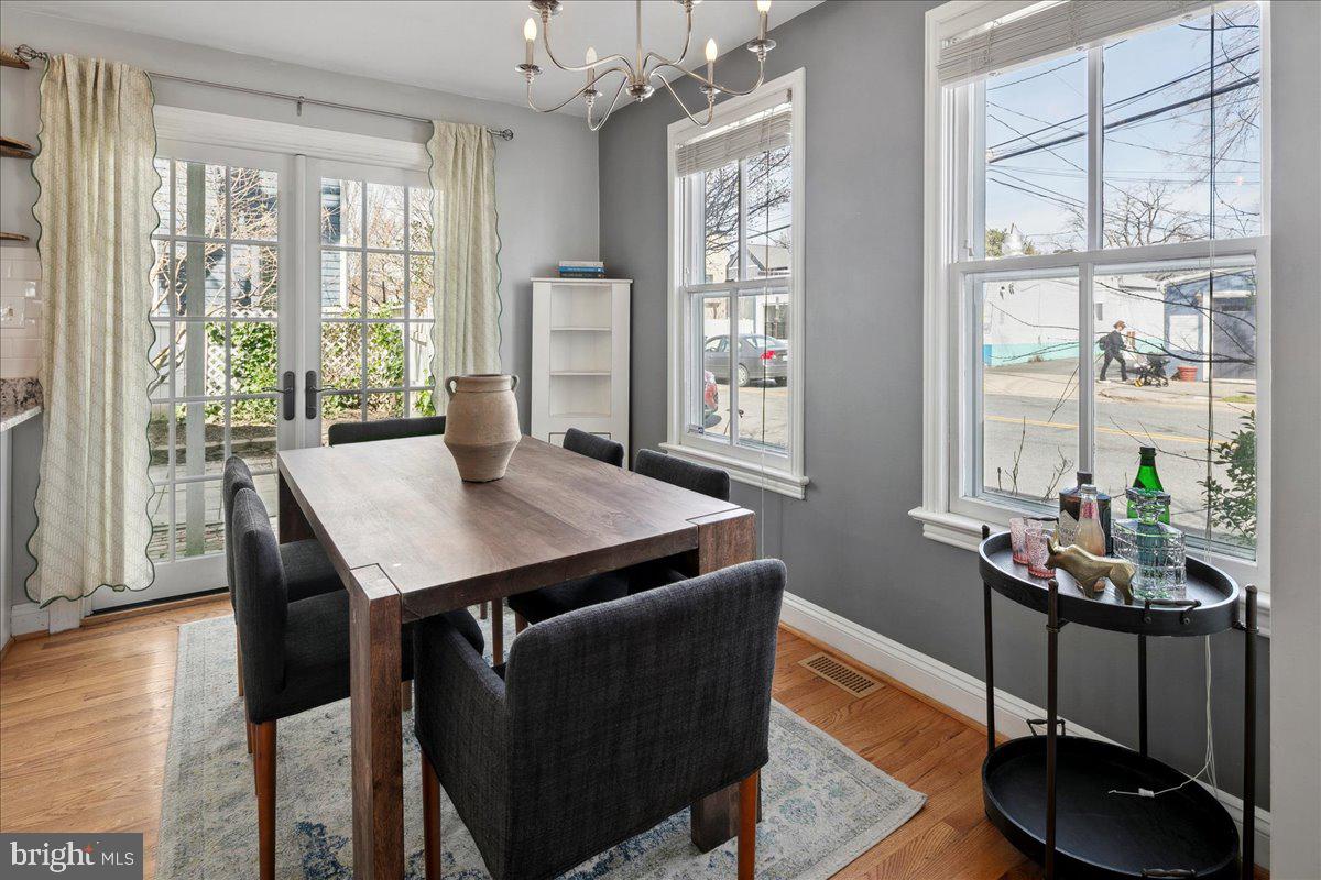 802 Pendleton Street Alexandria, VA 22314 - Photo 11 of 36 a view of a dining room with furniture window and outside view