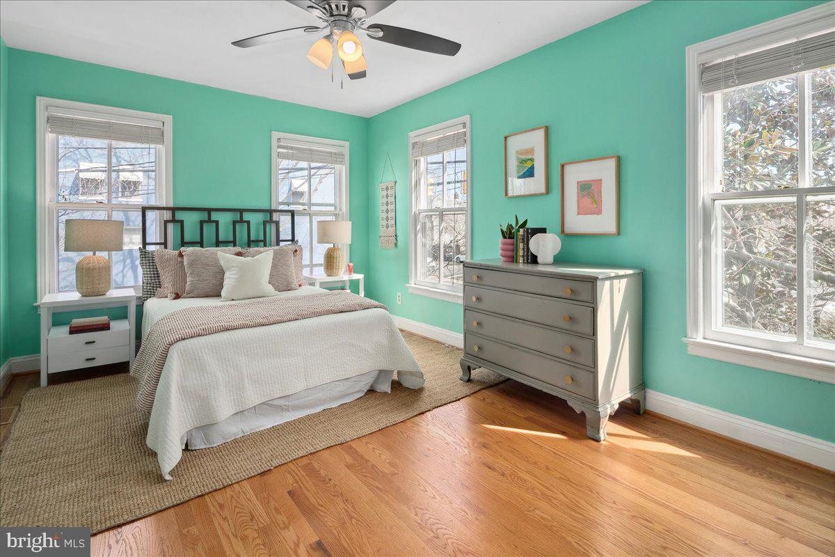 802 Pendleton Street Alexandria, VA 22314 - Photo 22 of 36 a bedroom with a bed and a window