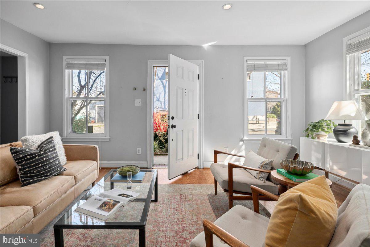802 Pendleton Street Alexandria, VA 22314 - Photo 4 of 36 a living room with furniture and wooden floor