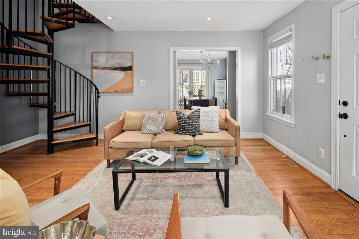 802 Pendleton Street Alexandria, VA 22314 - Photo 6 of 36 a living room with furniture a rug and a window