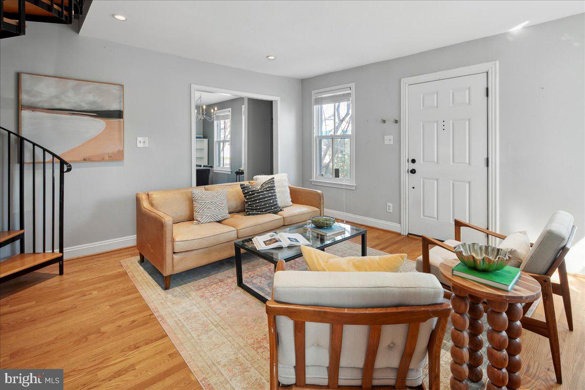 802 Pendleton Street Alexandria, VA 22314 - Photo 7 of 36 a living room with furniture and wooden floor
