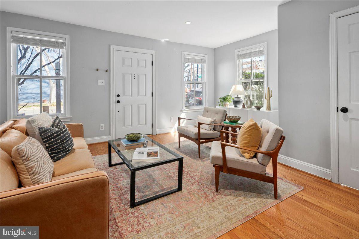 802 Pendleton Street Alexandria, VA 22314 - Photo 8 of 36 a living room with furniture and a window