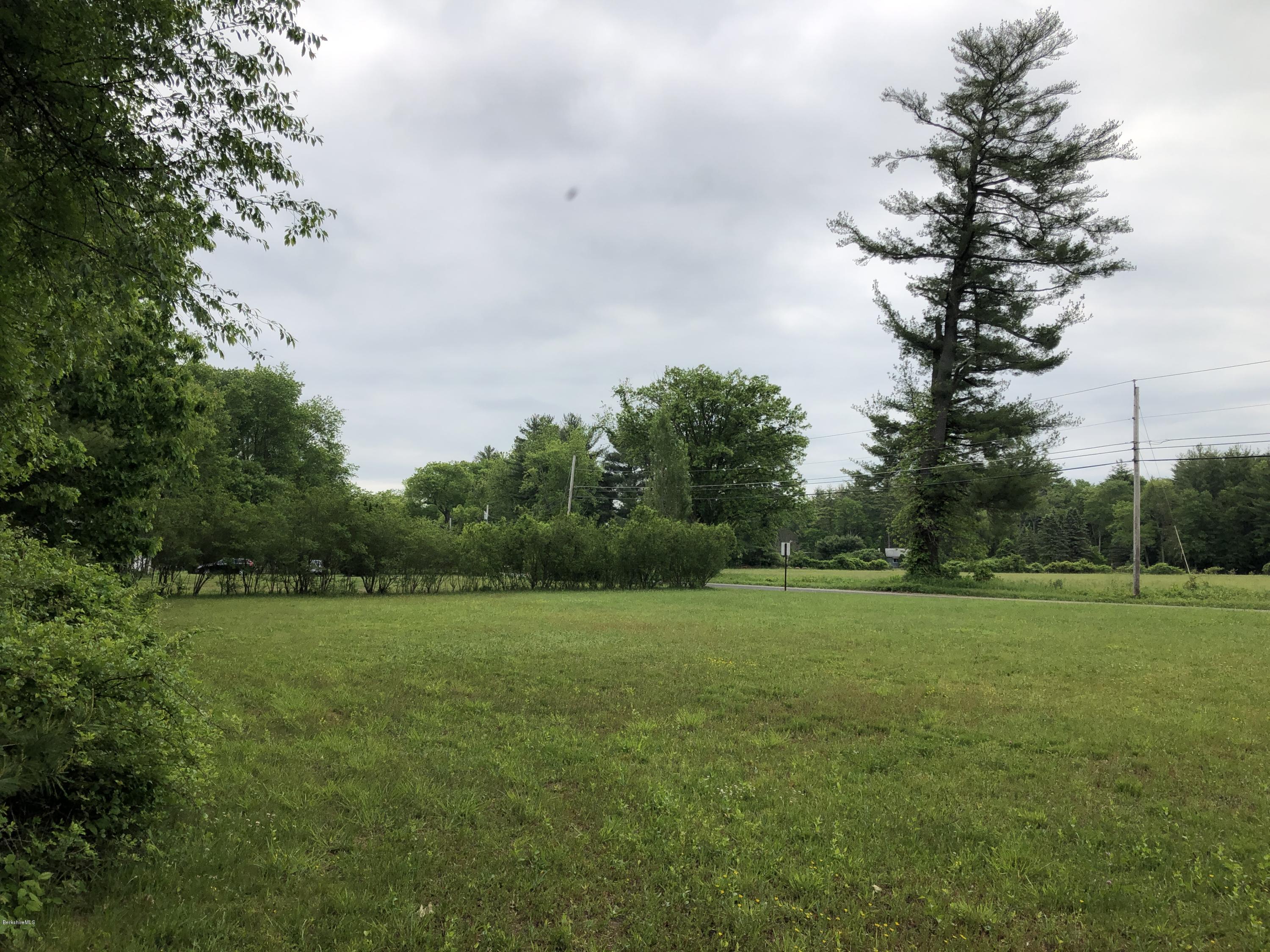 Salisbury Road Sheffield, MA 01257 - Photo 2 of 4 a view of a green field with trees in the background