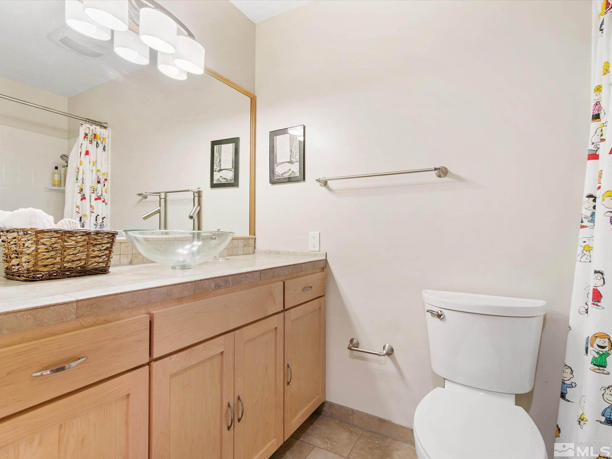 3750 Buckskin Road Carson City, NV 89703 - Photo 19 of 38 a bathroom with a toilet sink and mirror
