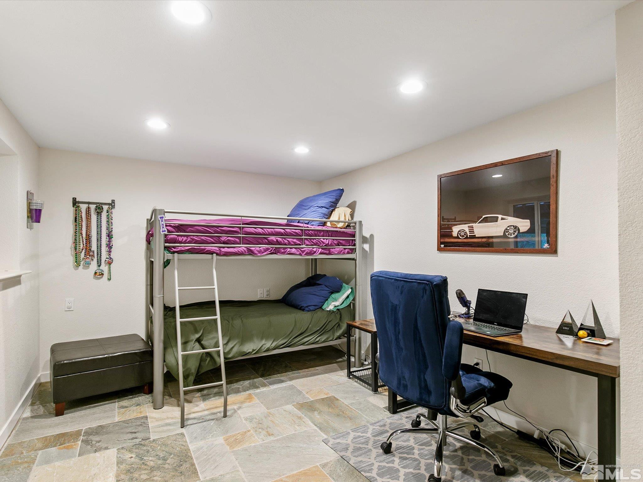 3750 Buckskin Road Carson City, NV 89703 - Photo 21 of 38 a bedroom with furniture and a air conditioner vent