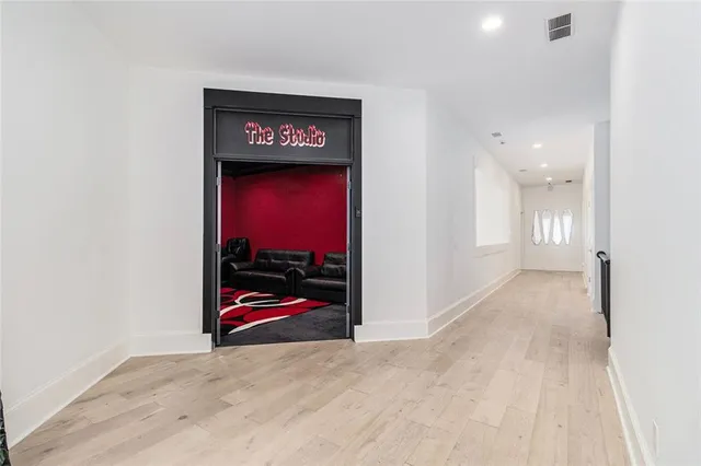 a view of a dining room with furniture and a window