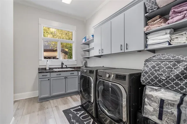 a view of a terrace with a bench and potted plants