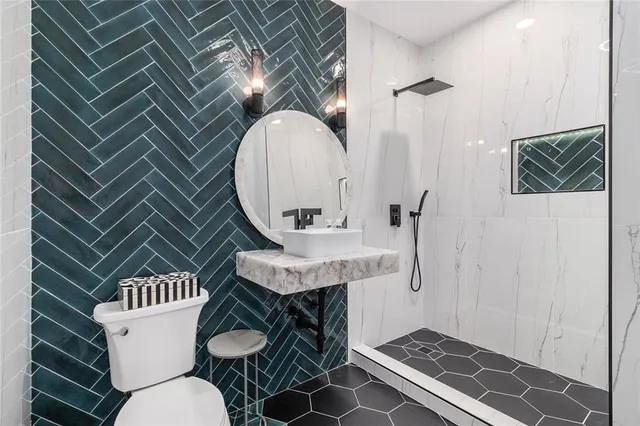 a view of a swimming pool with an outdoor seating