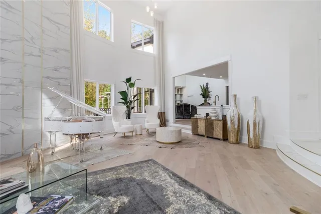 a living room with furniture and a table