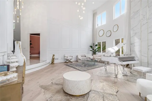 a view of a dining hall with furniture and wooden floor
