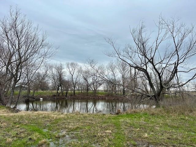 4260 Southwest 4260 Dawson, TX 76639 - Photo 2 of 7 a backyard of a house with a lake view