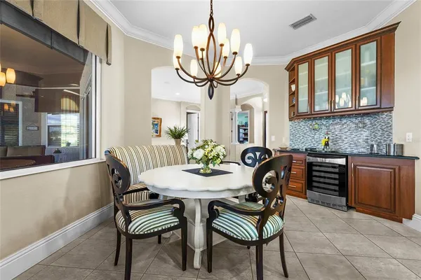 a building outdoor space with patio furniture and potted plants