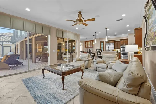 a kitchen with stainless steel appliances granite countertop a stove and a refrigerator