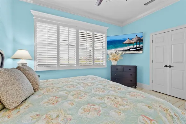 an aerial view of residential houses with outdoor space and swimming pool