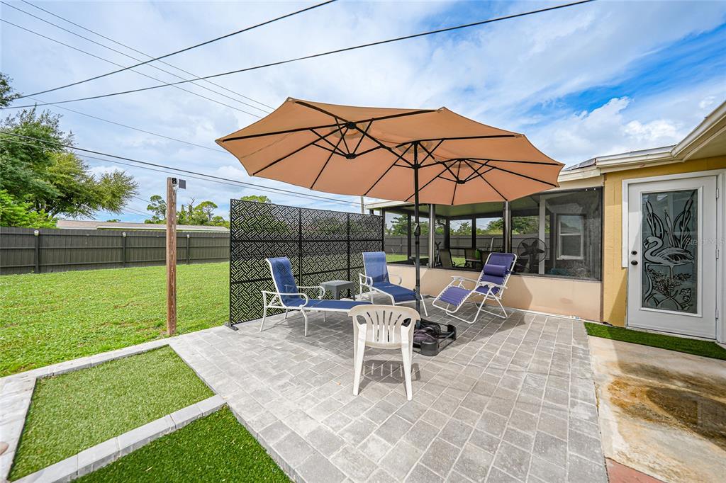 3119 Pinetree Street Port Charlotte, FL 33952 - Photo 22 of 23 a view of outdoor space yard deck and patio