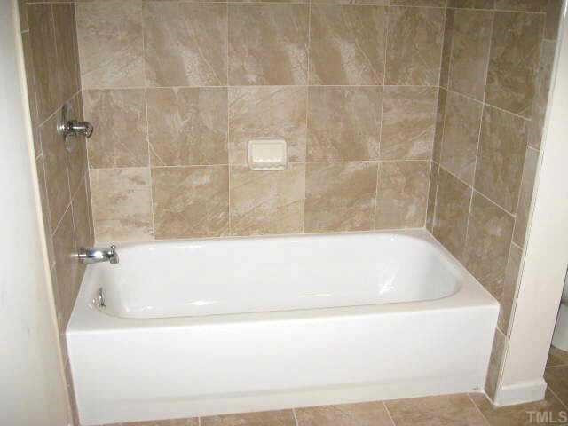 609 Brent Road Raleigh, NC 27606 - Photo 9 of 10 Beautiful upstairs full bath with new tile Other