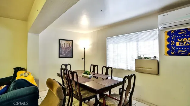 a kitchen with a stove top oven sink and cabinets