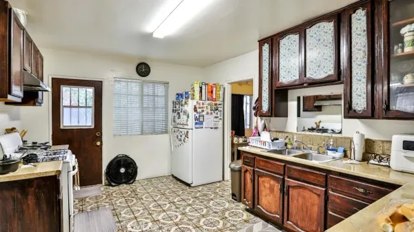 a bathroom with a sink toilet and mirror