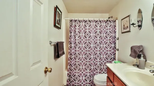 a bed room with a bed and a walk in closet