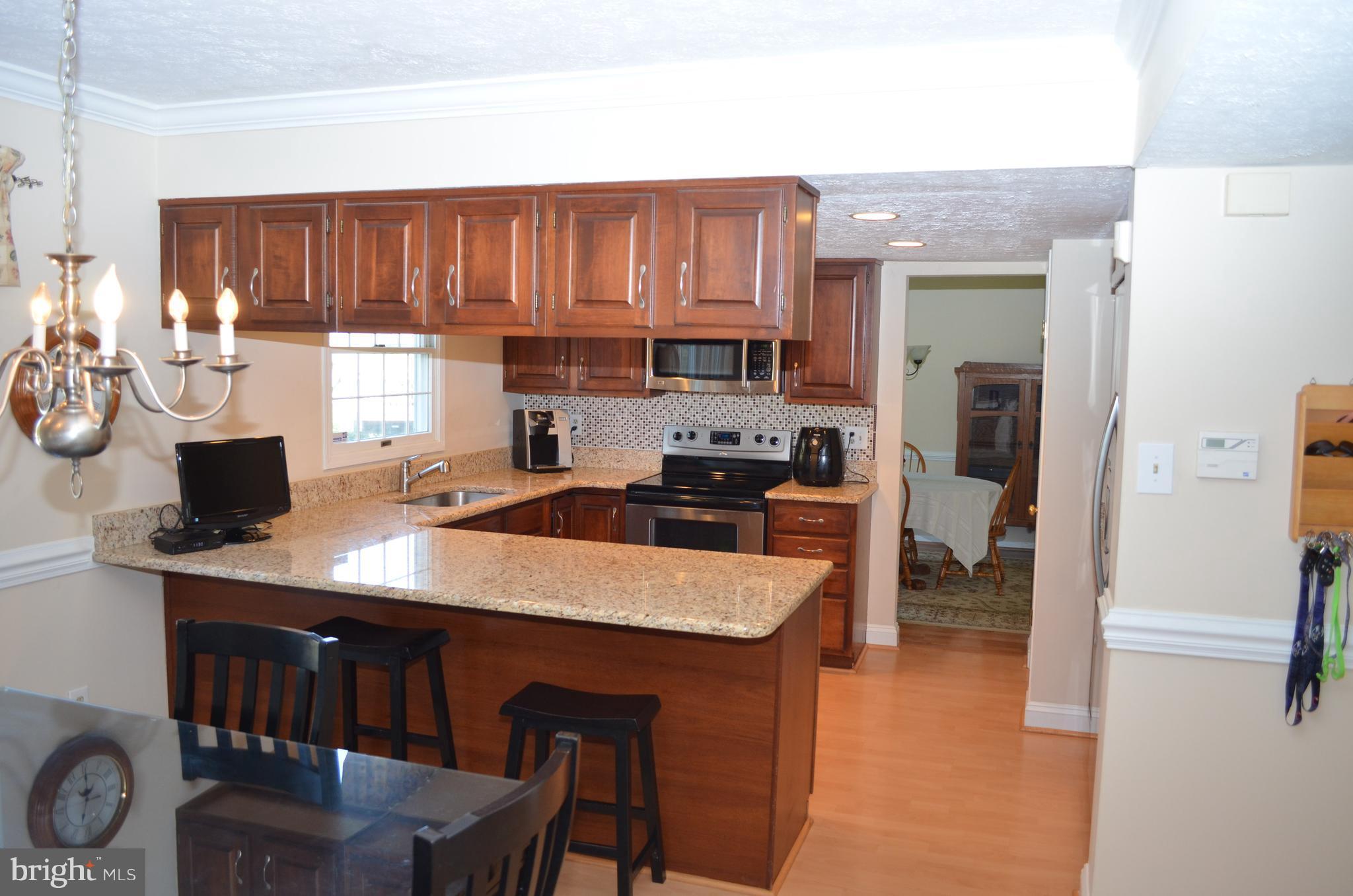 24 Highfields Drive Baltimore, MD 21228 - Photo 3 of 30 Kitchen with breakfast bar!