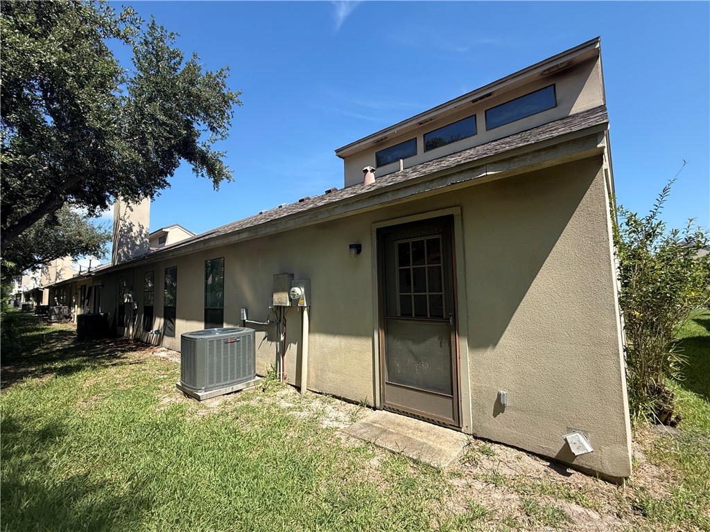 113 Santa Fe Rockport, TX 78382 - Photo 23 of 25 a backyard of a house with seating space