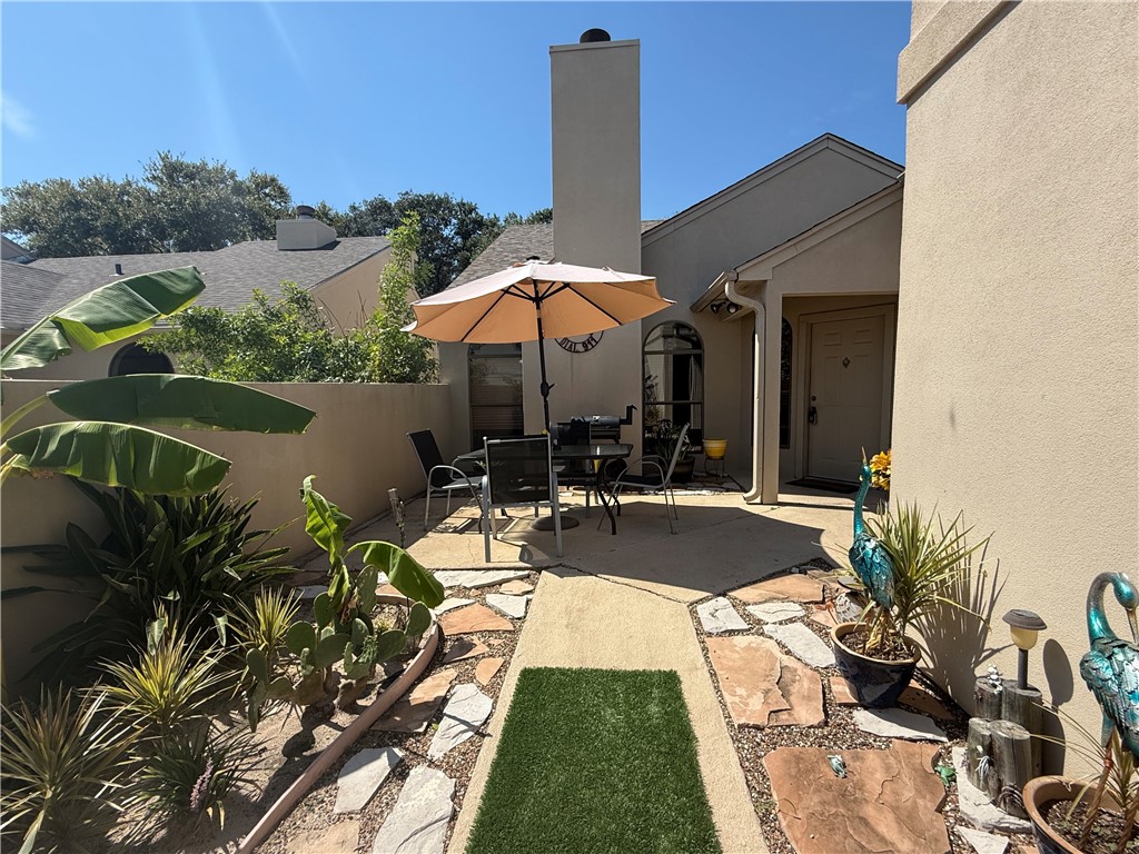 113 Santa Fe Rockport, TX 78382 - Photo 3 of 25 a view of a swimming pool with a patio