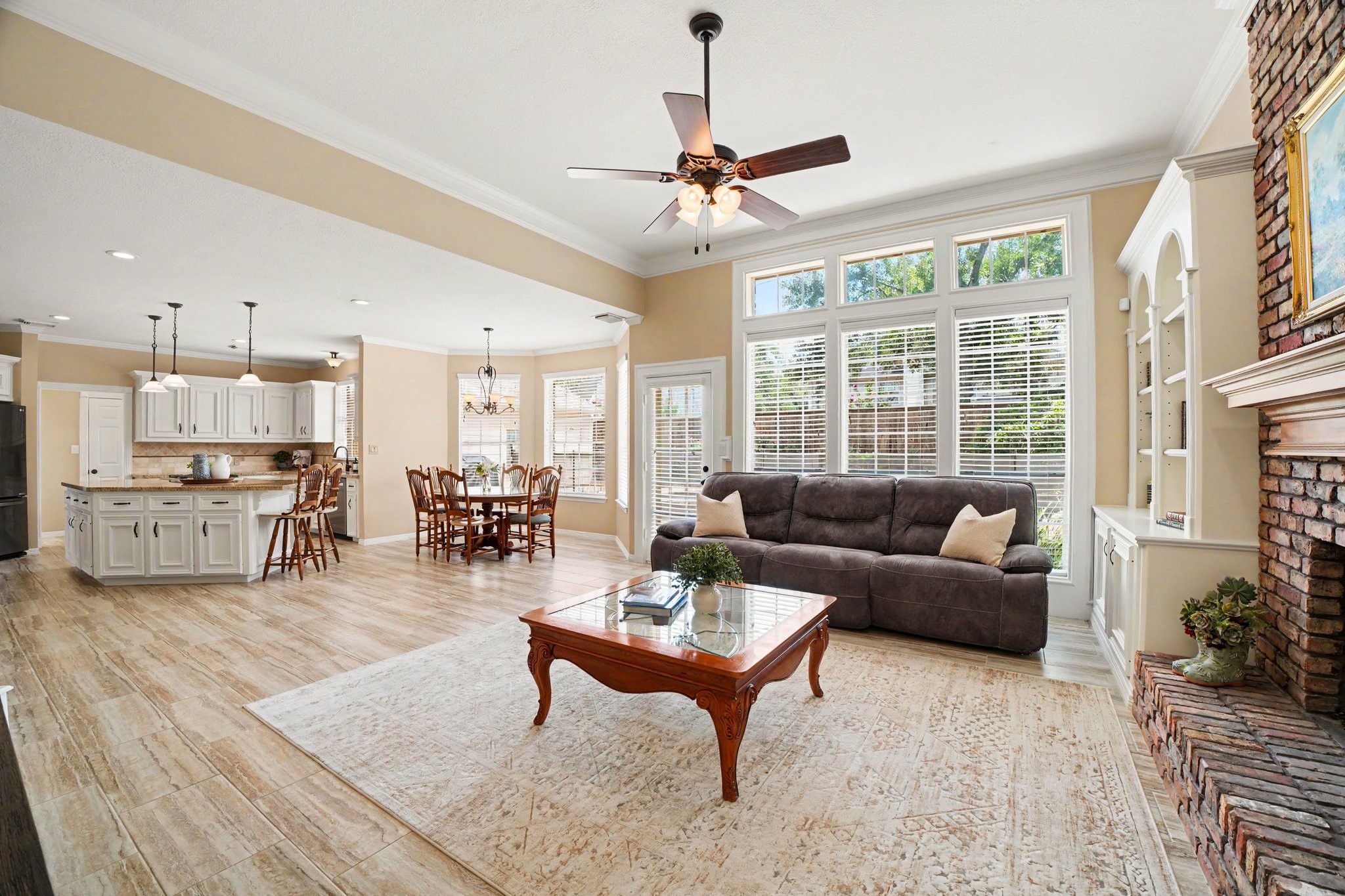 3411 Fir Forest Drive Spring, TX 77388 - Photo 15 of 39 The family room, kitchen and breakfast area feature many windows overlooking the breathtaking outdoor oasis.