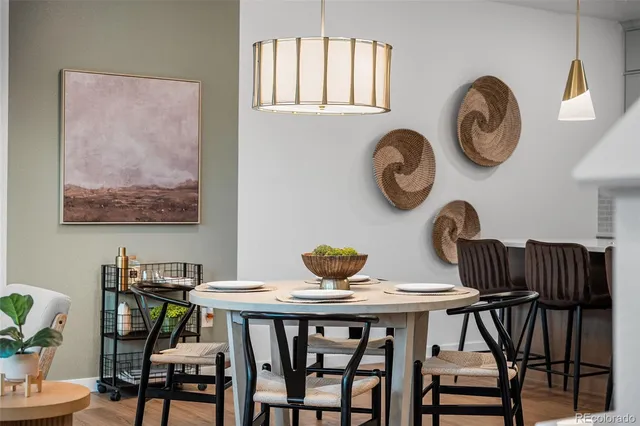 a view of a dining room with furniture and window