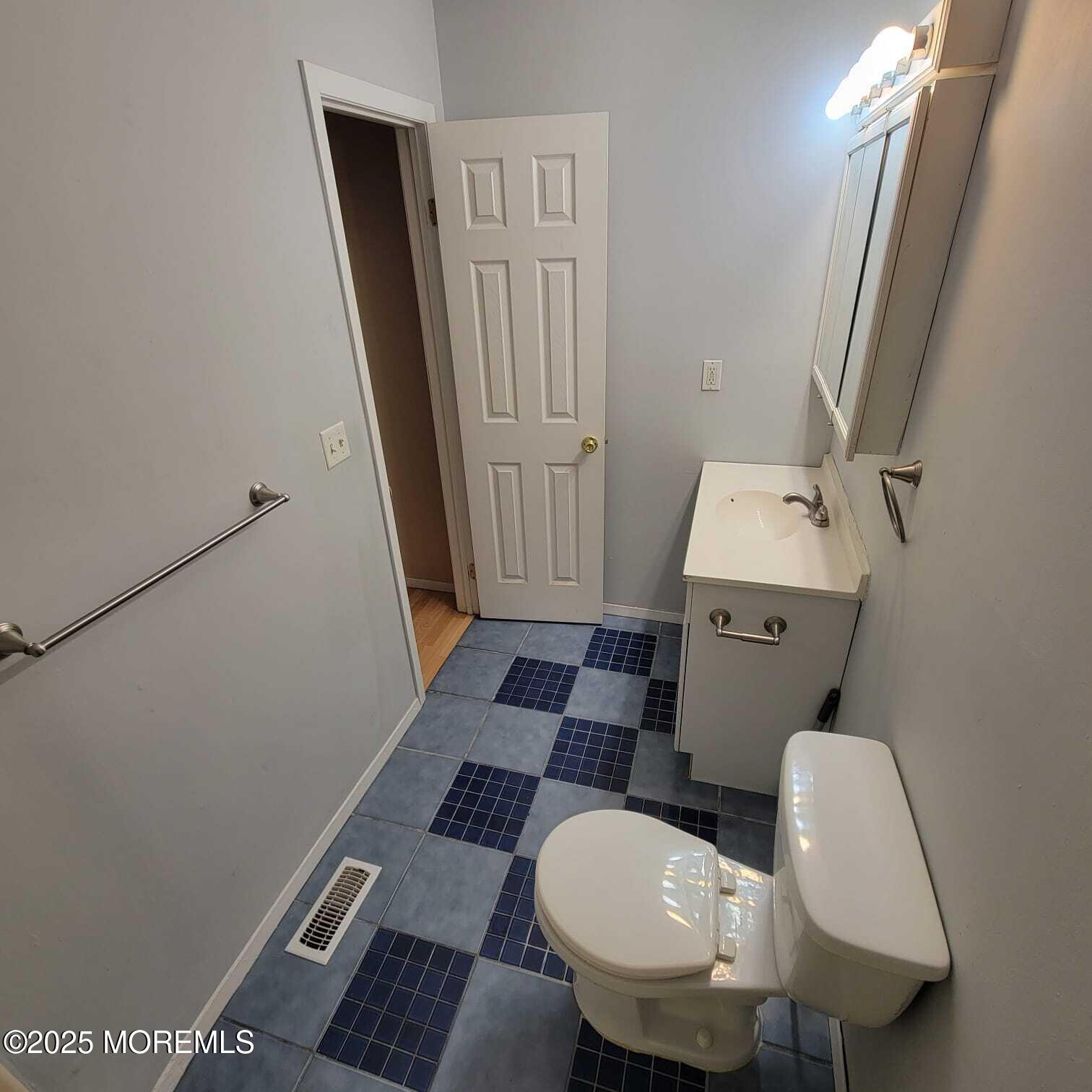 213 Main Street, Unit 4 Keansburg, NJ 07734 - Photo 14 of 27 a bathroom with a sink toilet and shower