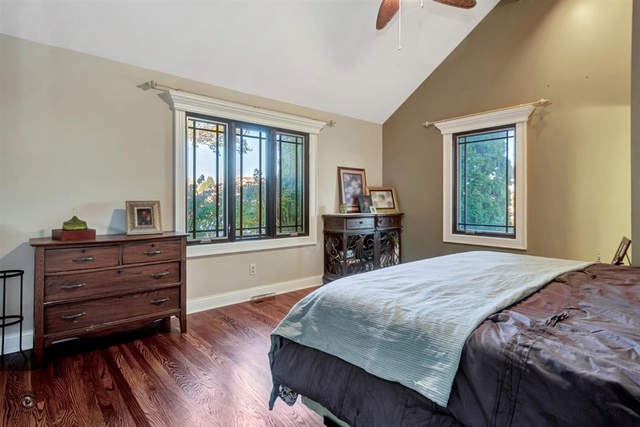 741 Longlane Road New Lenox, IL 60451 - Photo 12 of 28 a bedroom with a bed and a large window