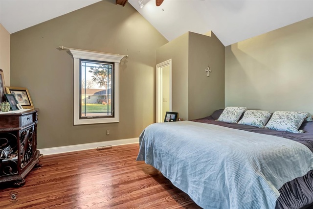 741 Longlane Road New Lenox, IL 60451 - Photo 13 of 28 a bedroom with a bed and a window