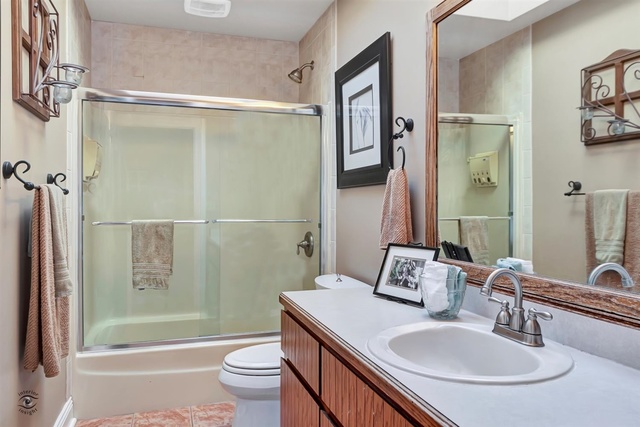 741 Longlane Road New Lenox, IL 60451 - Photo 16 of 28 a bathroom with a sink toilet tub and shower