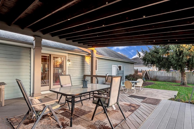 741 Longlane Road New Lenox, IL 60451 - Photo 23 of 28 a patio with glass top table and chairs