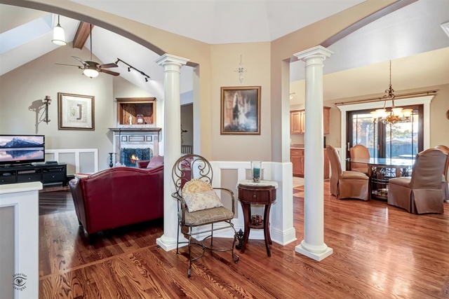 741 Longlane Road New Lenox, IL 60451 - Photo 4 of 28 a living room with furniture and a fireplace