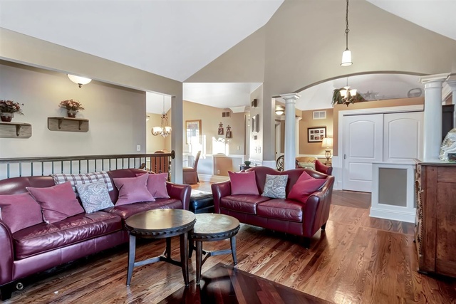 741 Longlane Road New Lenox, IL 60451 - Photo 6 of 28 a living room with furniture wooden floor and a flat screen tv