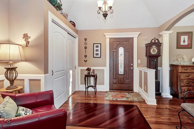 741 Longlane Road New Lenox, IL 60451 - Photo 7 of 28 a living room with furniture and a wooden floor