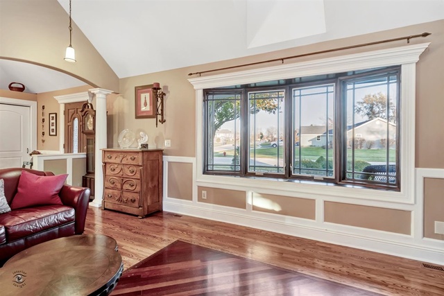 741 Longlane Road New Lenox, IL 60451 - Photo 8 of 28 a living room with furniture and a large window